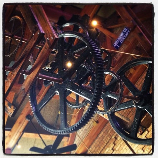 Old pulley system in a Chicago pizzeria. Renovating things from our past can be just as rewarding as starting new. #glintadvertising